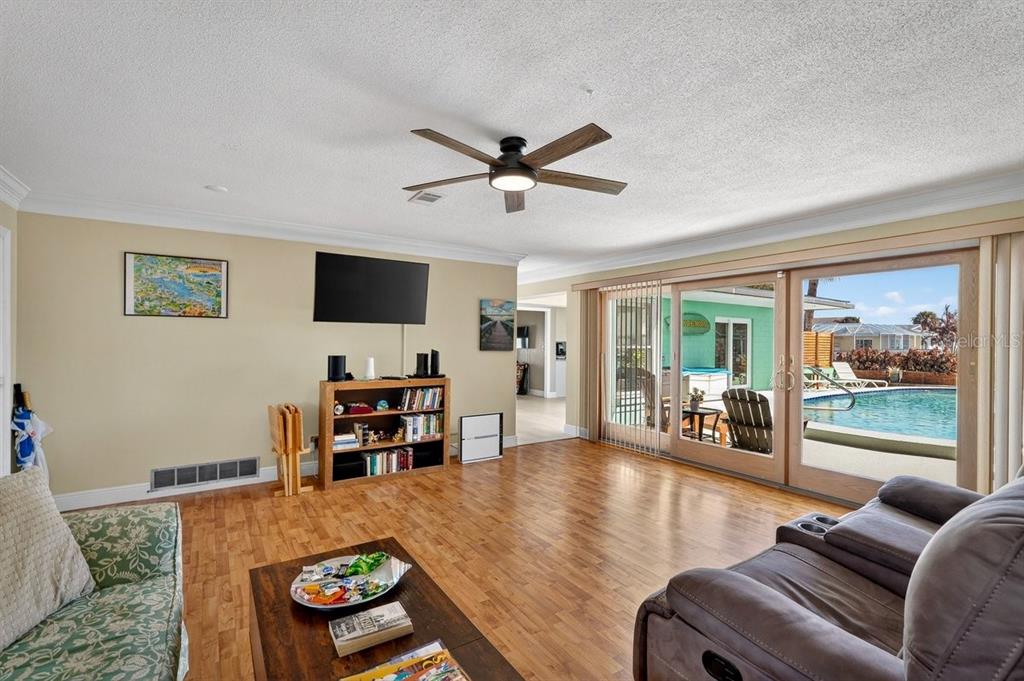 119 Carriage Ponce Inlet, FL 32127 - Photo 6 of 67 a living room with furniture and a flat screen tv