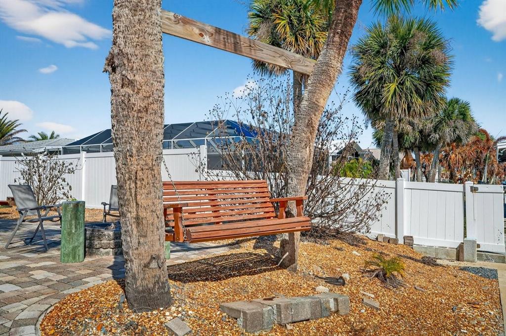 119 Carriage Ponce Inlet, FL 32127 - Photo 61 of 67 a view of a backyard with a tree