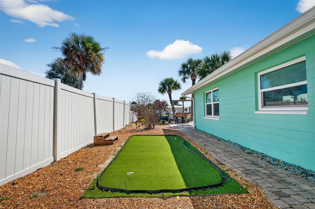 119 Carriage Ponce Inlet, FL 32127 - Photo 64 of 67 a view of a backyard with a garden