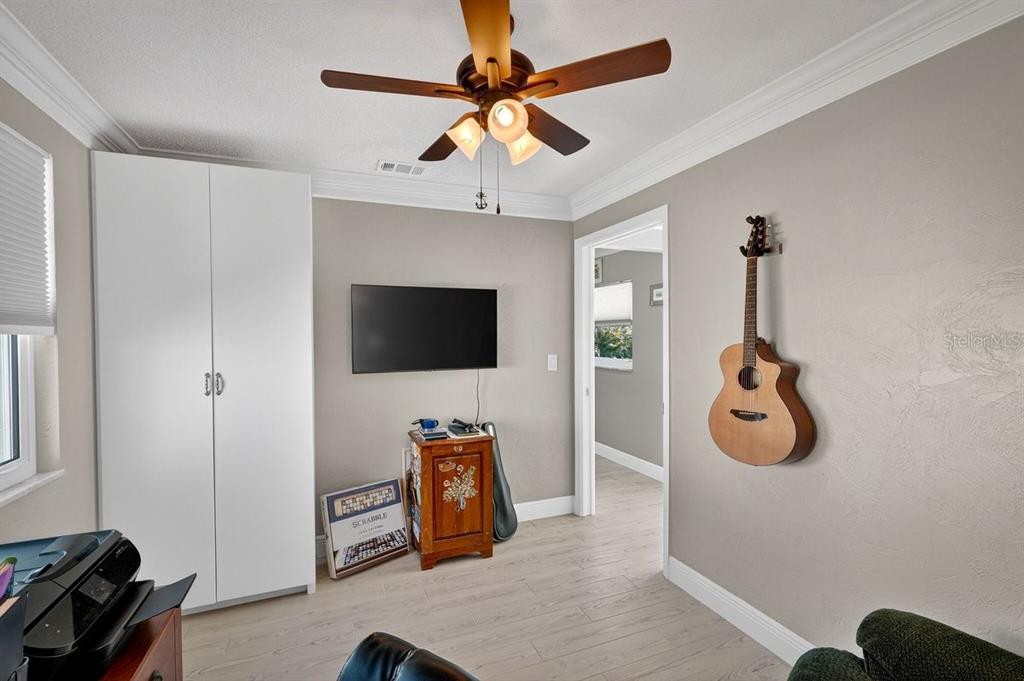 119 Carriage Ponce Inlet, FL 32127 - Photo 10 of 67 a living room with furniture and a flat screen tv