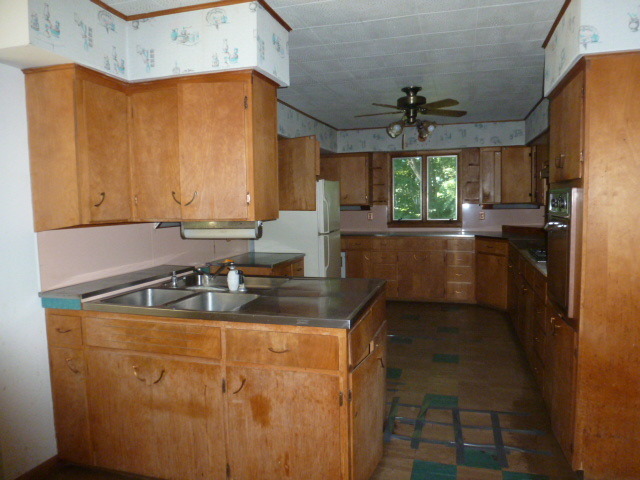 19659 West Manhattan Road Elwood, IL 60421 - Photo 13 of 25 a kitchen with sink cabinets and window