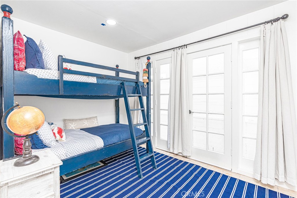 3717 Channel Place Newport Beach, CA 92663 - Photo 18 of 41 a living room with furniture and wooden floor