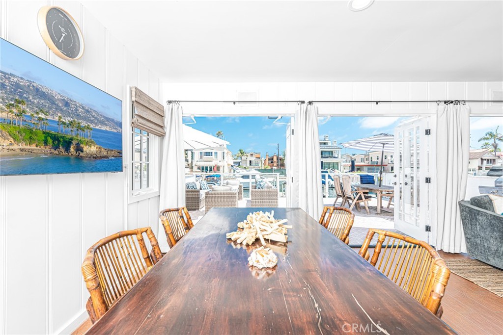 3717 Channel Place Newport Beach, CA 92663 - Photo 25 of 41 a living room with furniture and a table