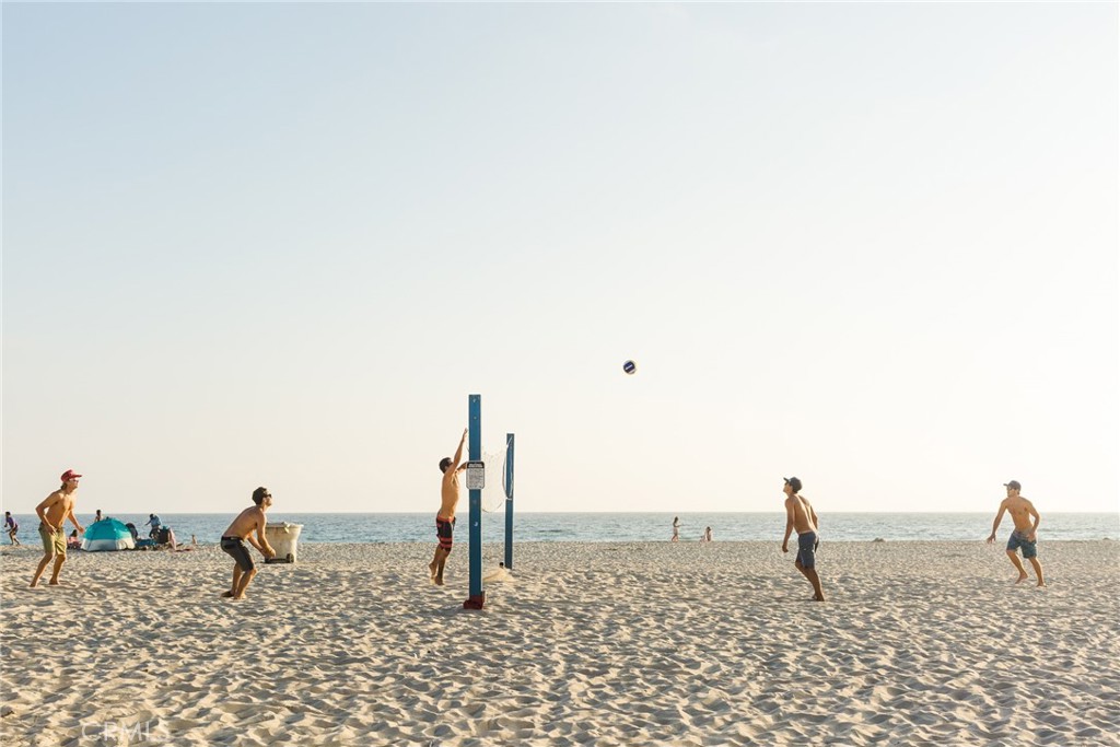3717 Channel Place Newport Beach, CA 92663 - Photo 41 of 41 a group of people sitting in a backyard
