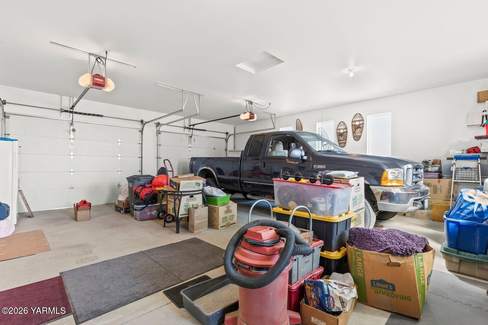 801 Lancaster Road Selah, WA 98942 - Photo 16 of 20 a storage room with lots of stuff and toys