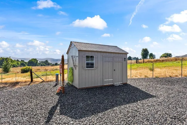 a view of a house with a ocean view