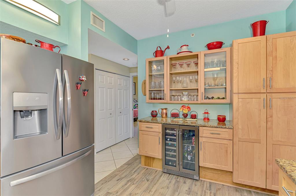 6546 Fairway Gardens Drive, Unit 6546 Bradenton, FL 34203 - Photo 20 of 70 a kitchen with a refrigerator and a refrigerator