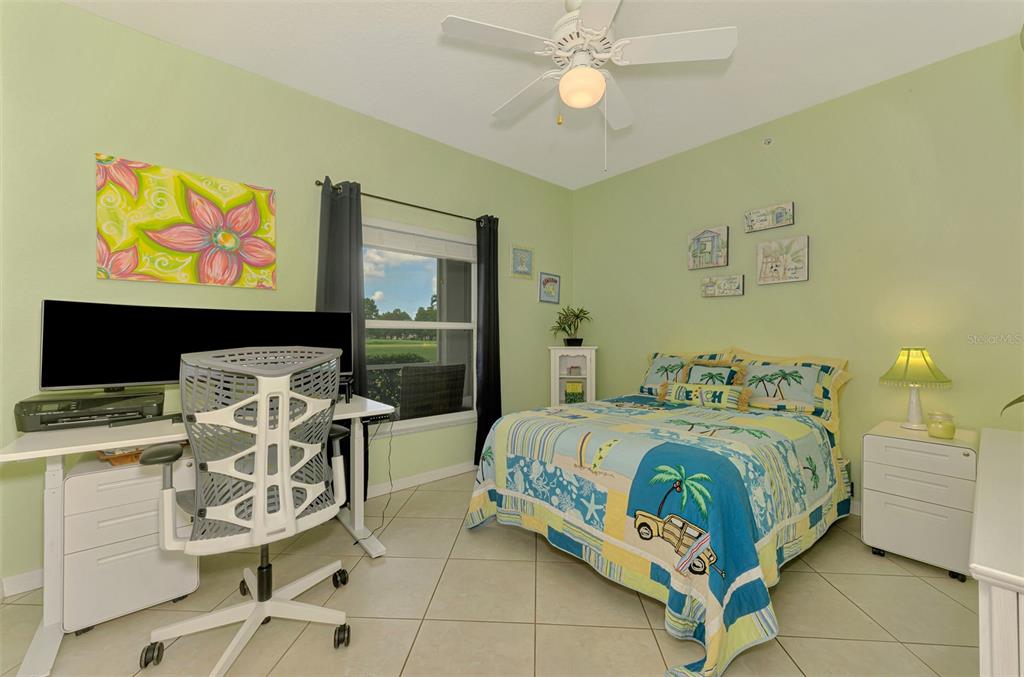 6546 Fairway Gardens Drive, Unit 6546 Bradenton, FL 34203 - Photo 28 of 70 a bedroom with a bed and furniture