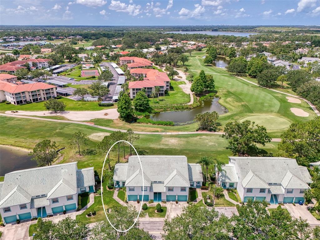 6546 Fairway Gardens Drive, Unit 6546 Bradenton, FL 34203 - Photo 39 of 70 an aerial view of residential houses with outdoor space and lake view