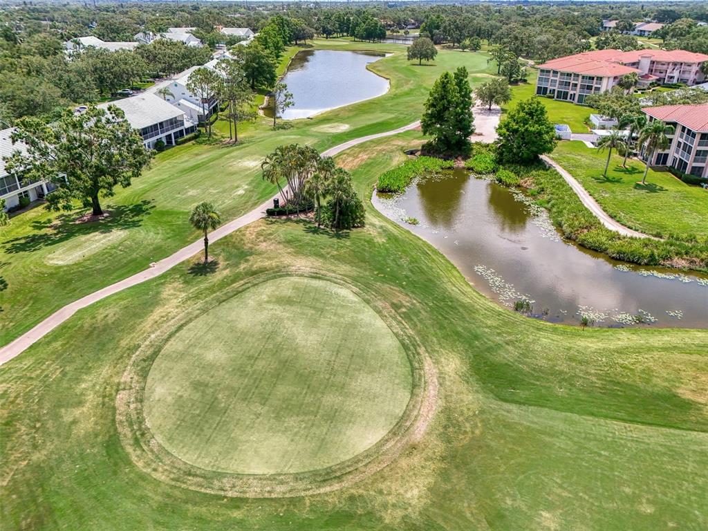 6546 Fairway Gardens Drive, Unit 6546 Bradenton, FL 34203 - Photo 49 of 70 an aerial view of residential houses with outdoor space