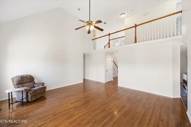 a view of kitchen with cabinets and wooden floor