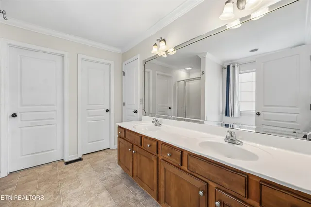a white bath tub sitting in a bathroom with a bathtub
