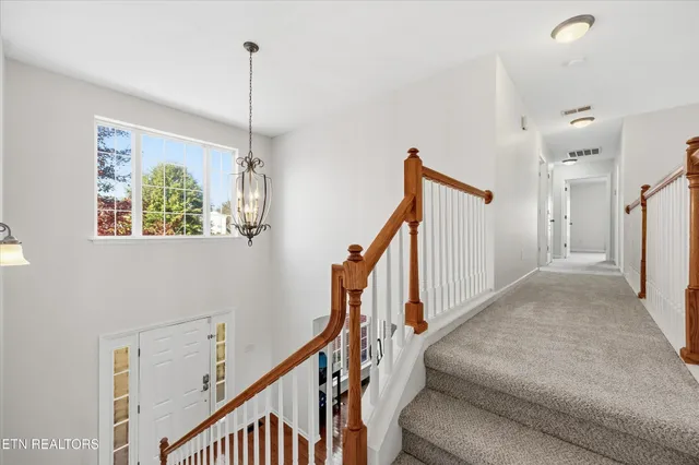 a bedroom with bed and window