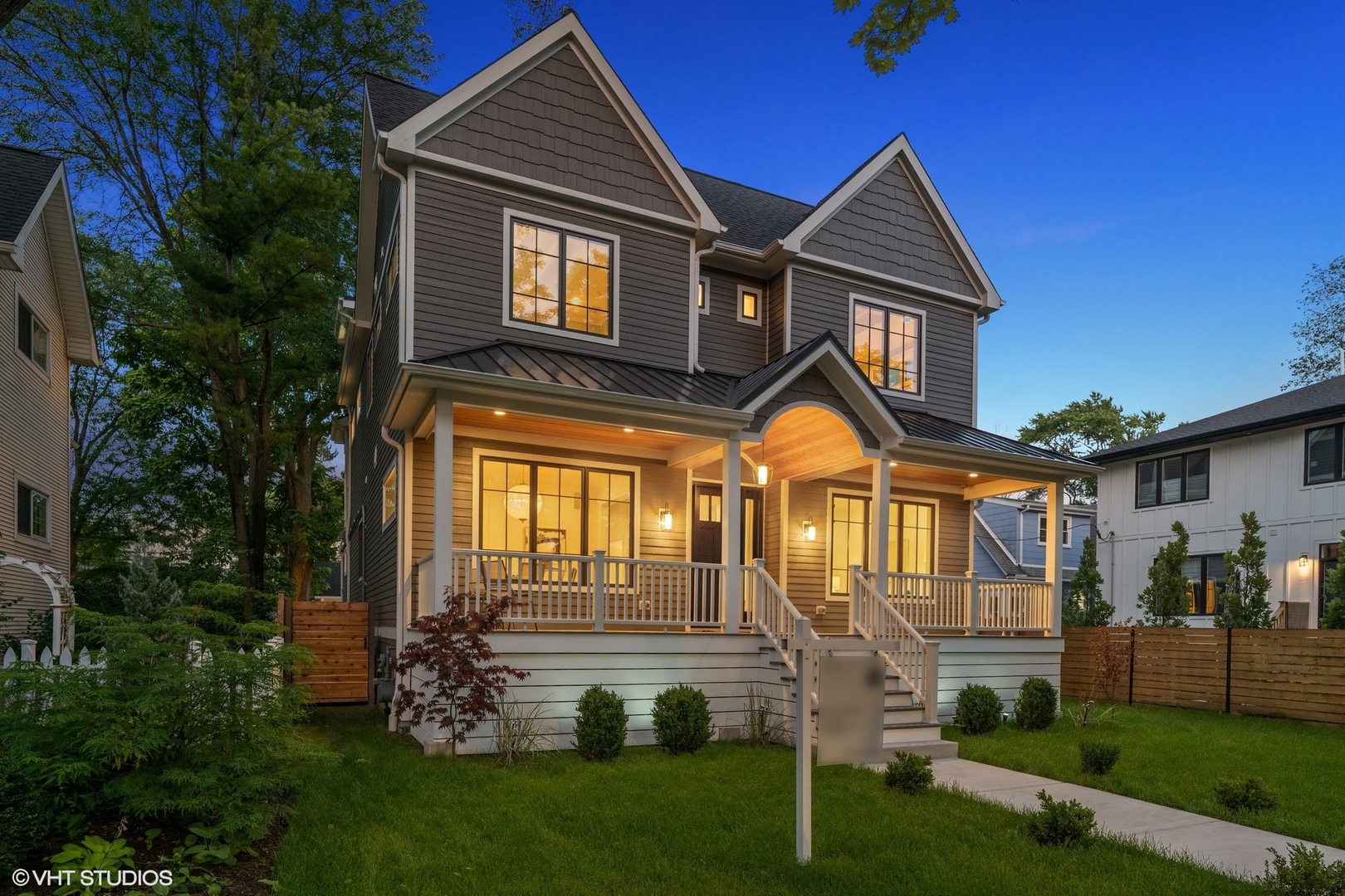 3811 North Kildare Avenue Chicago, IL 60641 - Photo 115 of 126 a front view of a house with a yard and trees