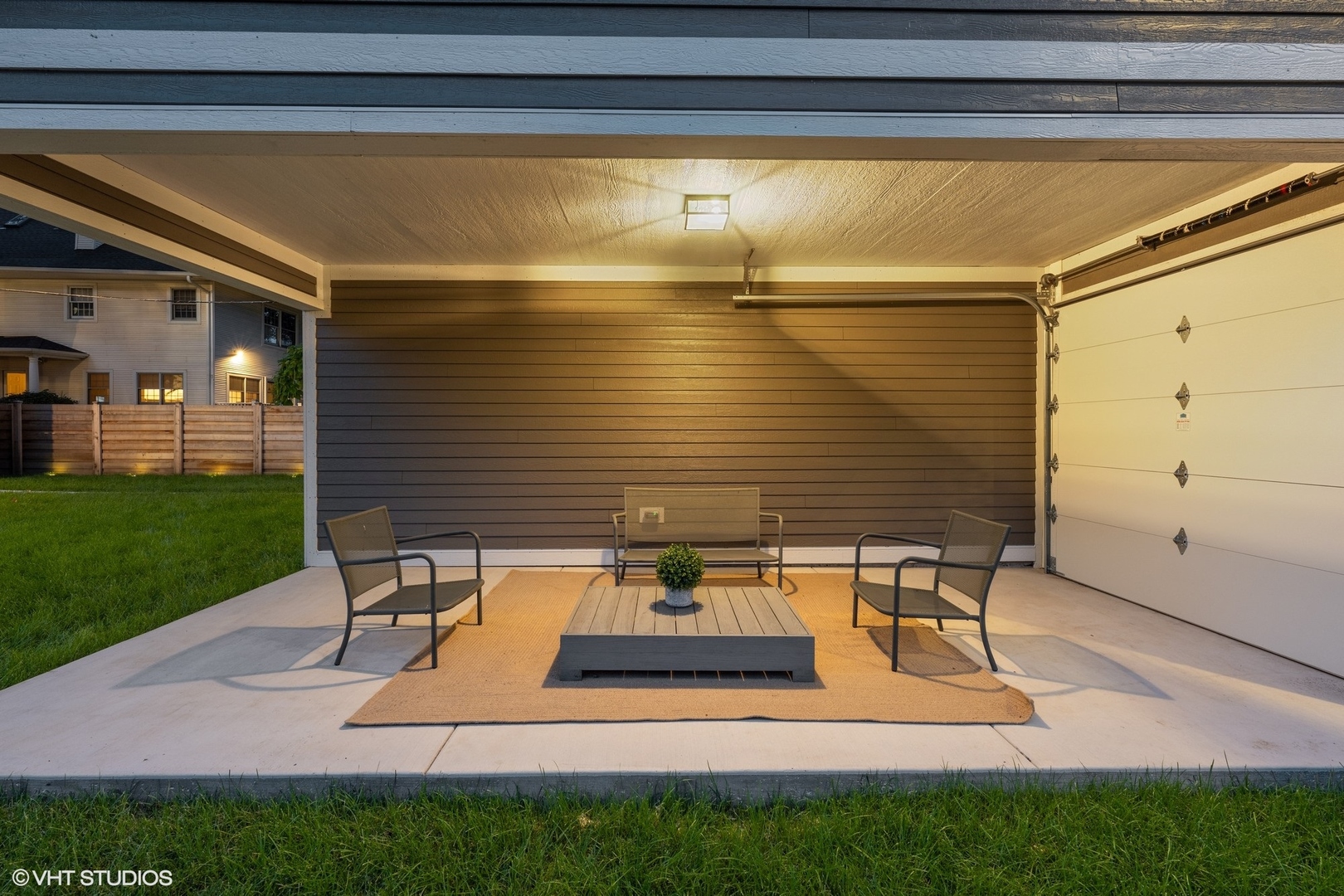 3811 North Kildare Avenue Chicago, IL 60641 - Photo 119 of 126 a view of a patio with table and chairs and garden