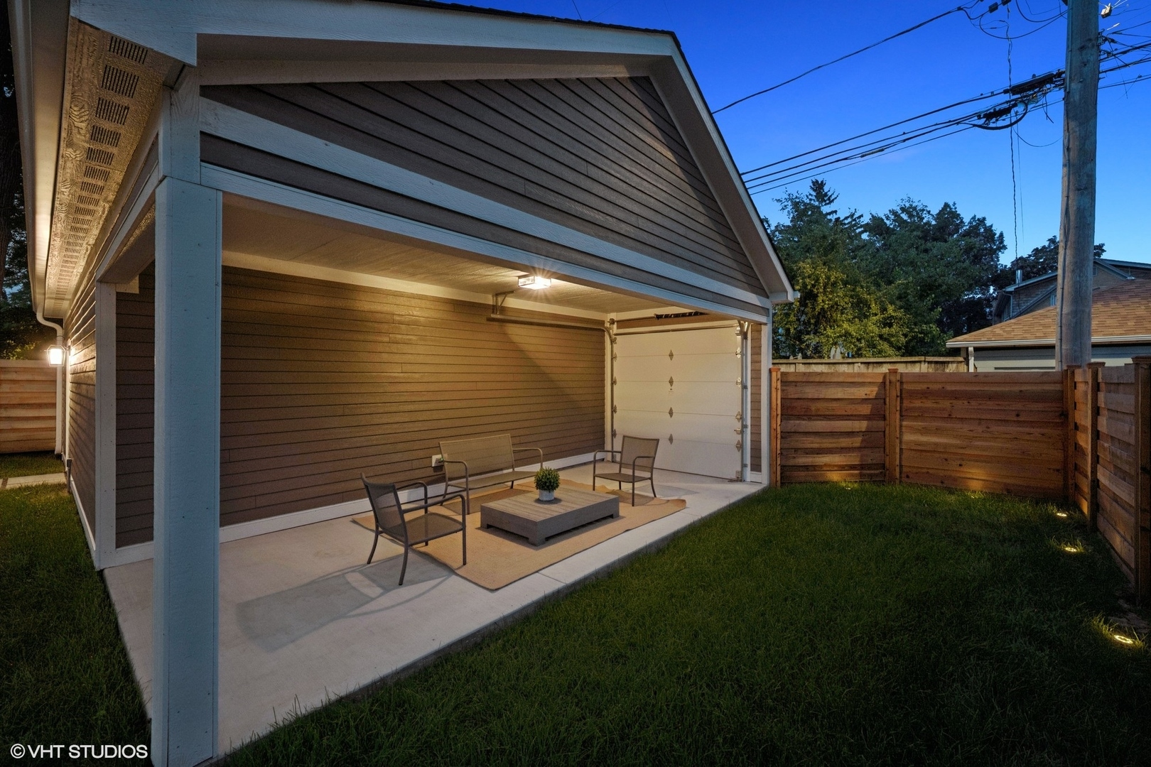 3811 North Kildare Avenue Chicago, IL 60641 - Photo 121 of 126 a backyard of a house with table and chairs