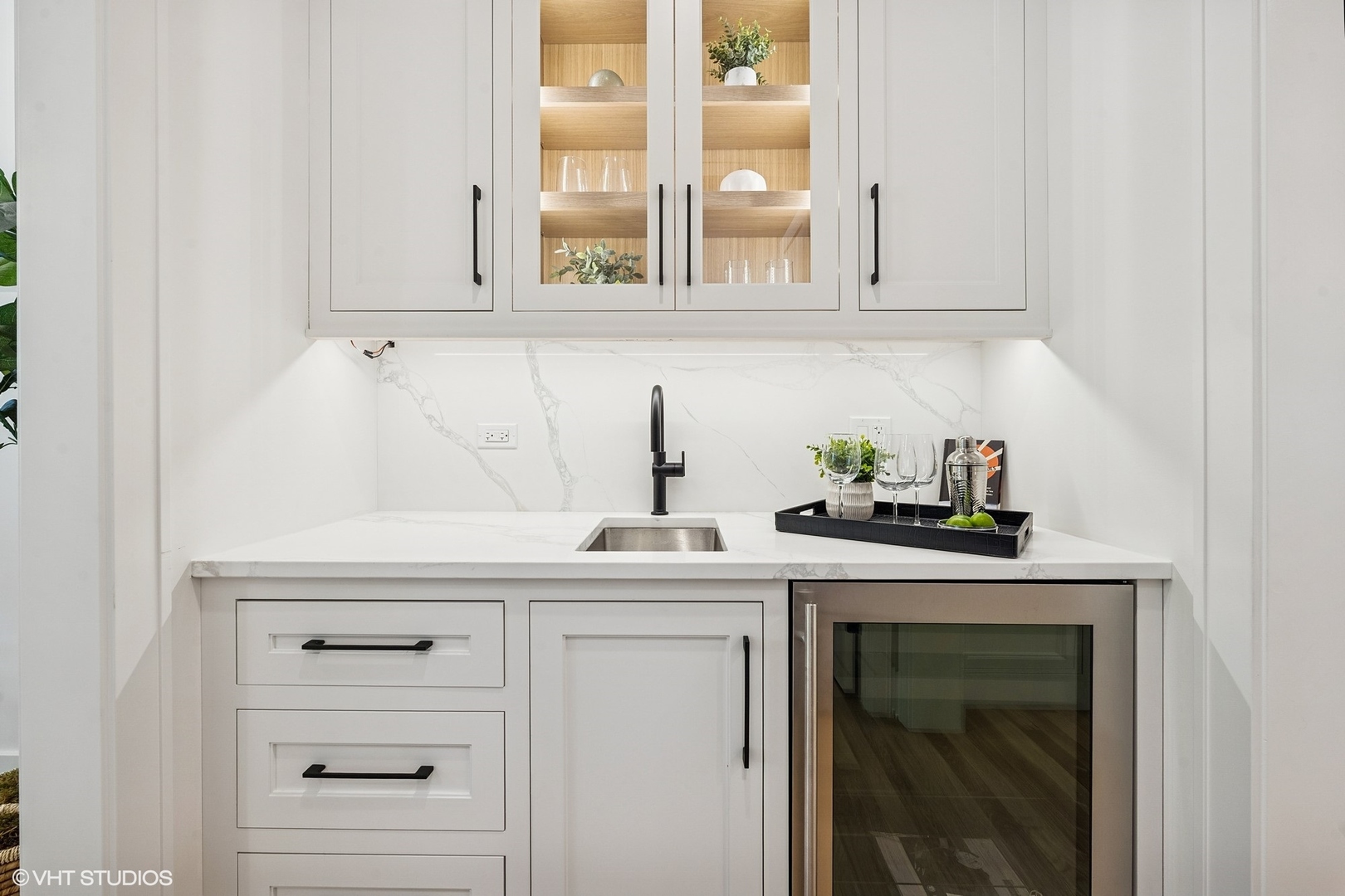 3811 North Kildare Avenue Chicago, IL 60641 - Photo 17 of 126 a kitchen with white cabinets and a sink