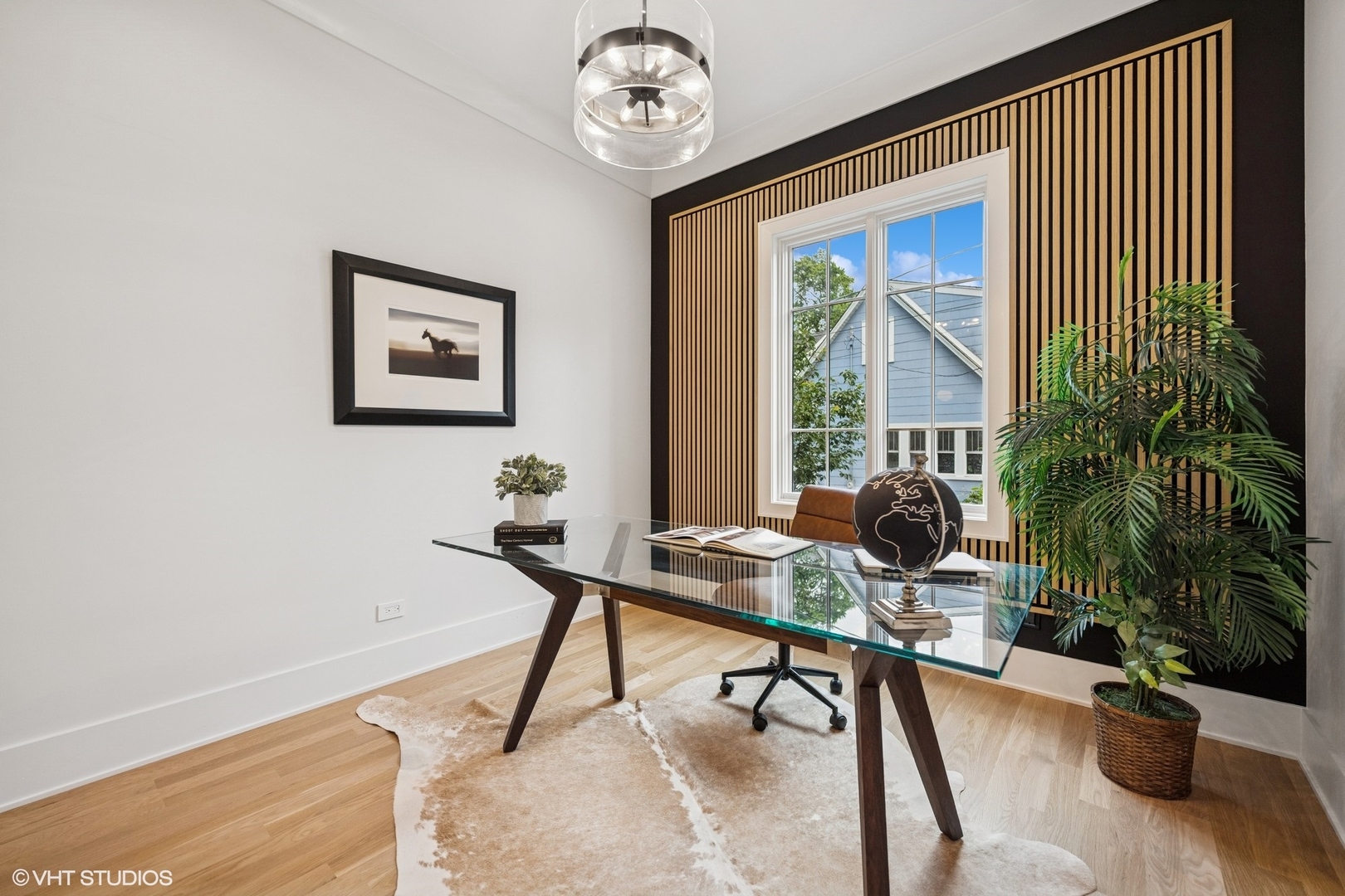 3811 North Kildare Avenue Chicago, IL 60641 - Photo 36 of 126 a work room with furniture and a potted plant