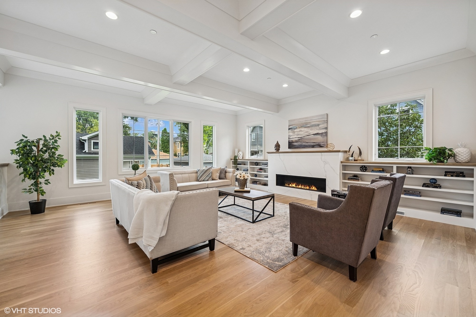 3811 North Kildare Avenue Chicago, IL 60641 - Photo 39 of 126 a living room with fireplace furniture and a large window