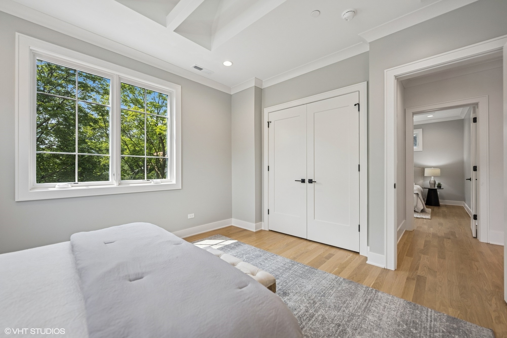 3811 North Kildare Avenue Chicago, IL 60641 - Photo 56 of 126 a view of a bedroom with wooden floor and a window