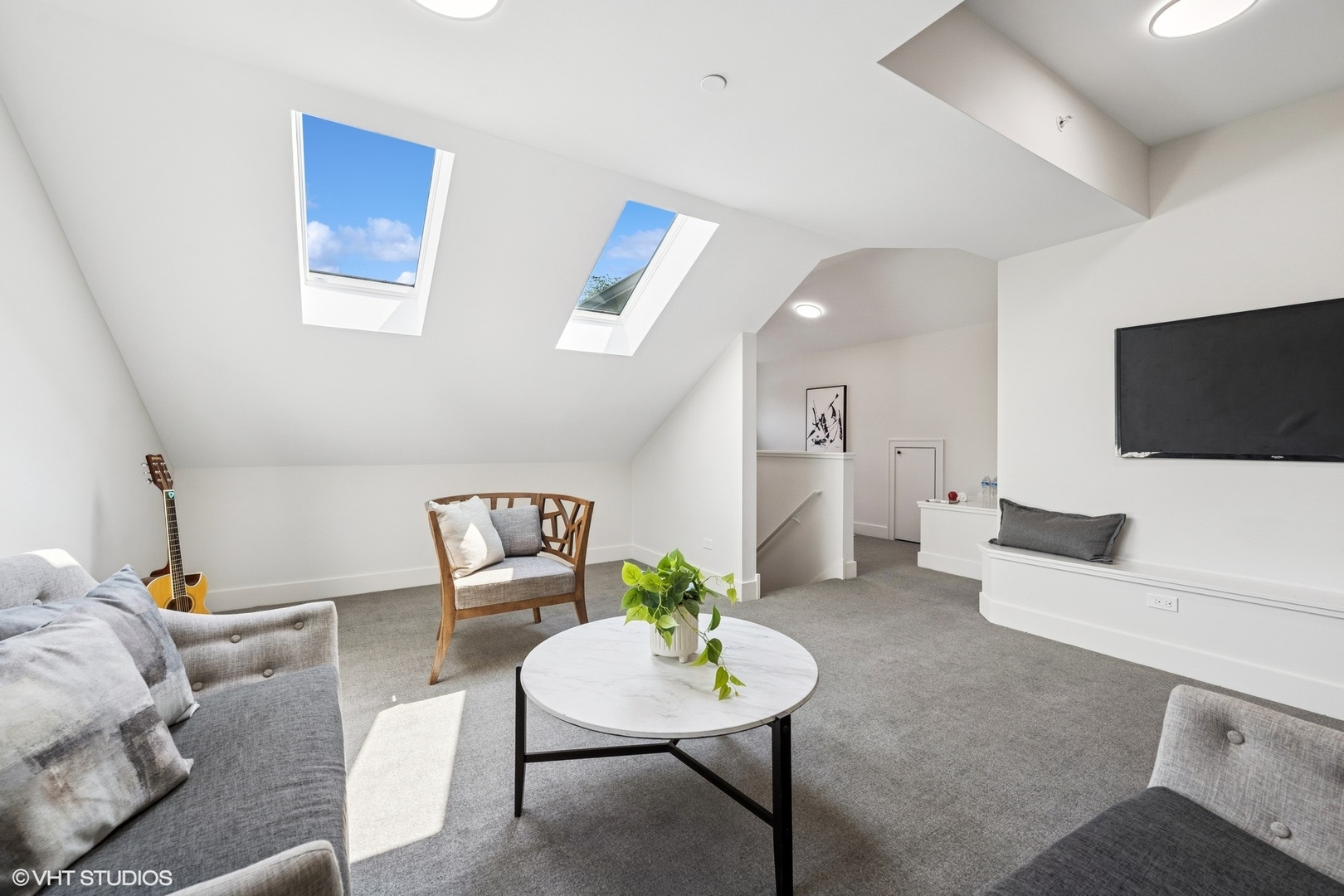 3811 North Kildare Avenue Chicago, IL 60641 - Photo 77 of 126 a living room with furniture and a flat screen tv
