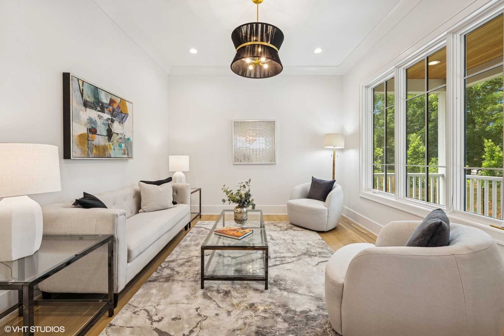 3811 North Kildare Avenue Chicago, IL 60641 - Photo 9 of 126 a living room with furniture and floor to ceiling windows