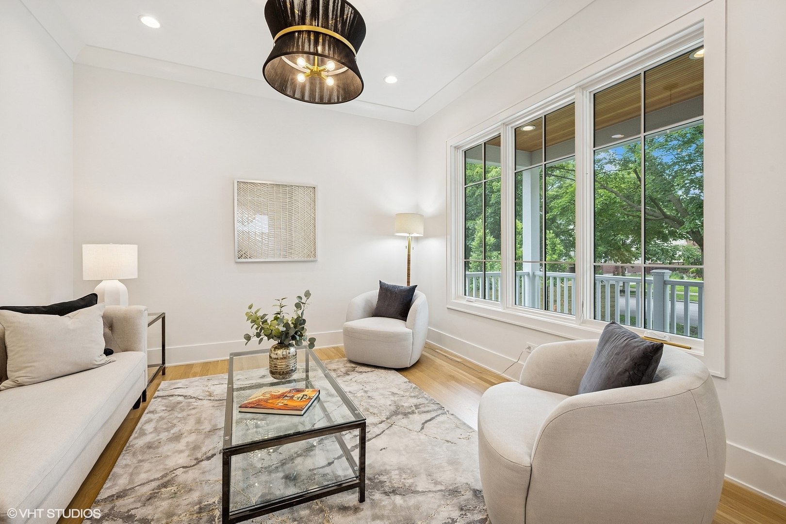3811 North Kildare Avenue Chicago, IL 60641 - Photo 10 of 126 a living room with furniture and a large window