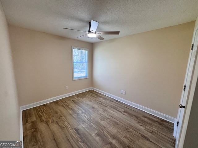 156 Torrance Road Southwest Milledgeville, GA 31061 - Photo 11 of 16 an empty room with a window and ceiling fan