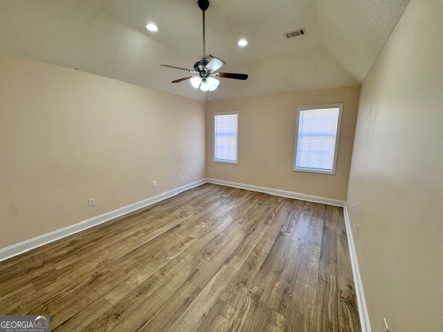 156 Torrance Road Southwest Milledgeville, GA 31061 - Photo 13 of 16 wooden floor in an empty room with a window