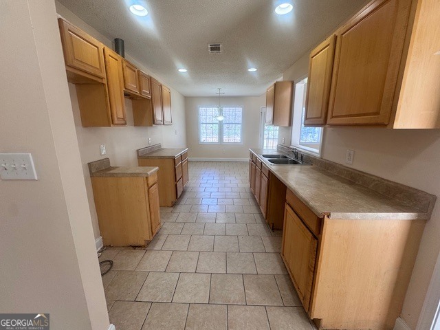 156 Torrance Road Southwest Milledgeville, GA 31061 - Photo 7 of 16 a kitchen with stainless steel appliances granite countertop a sink stove and cabinets