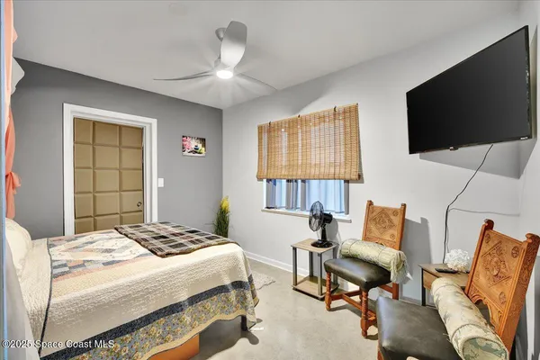 a kitchen with a cabinets and chairs in it