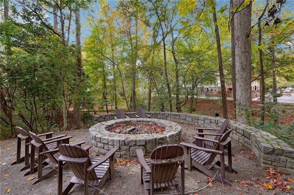 360 Chambers Street, Unit 210 Woodstock, GA 30188 - Photo 26 of 36 a view of an outdoor space with table and chairs