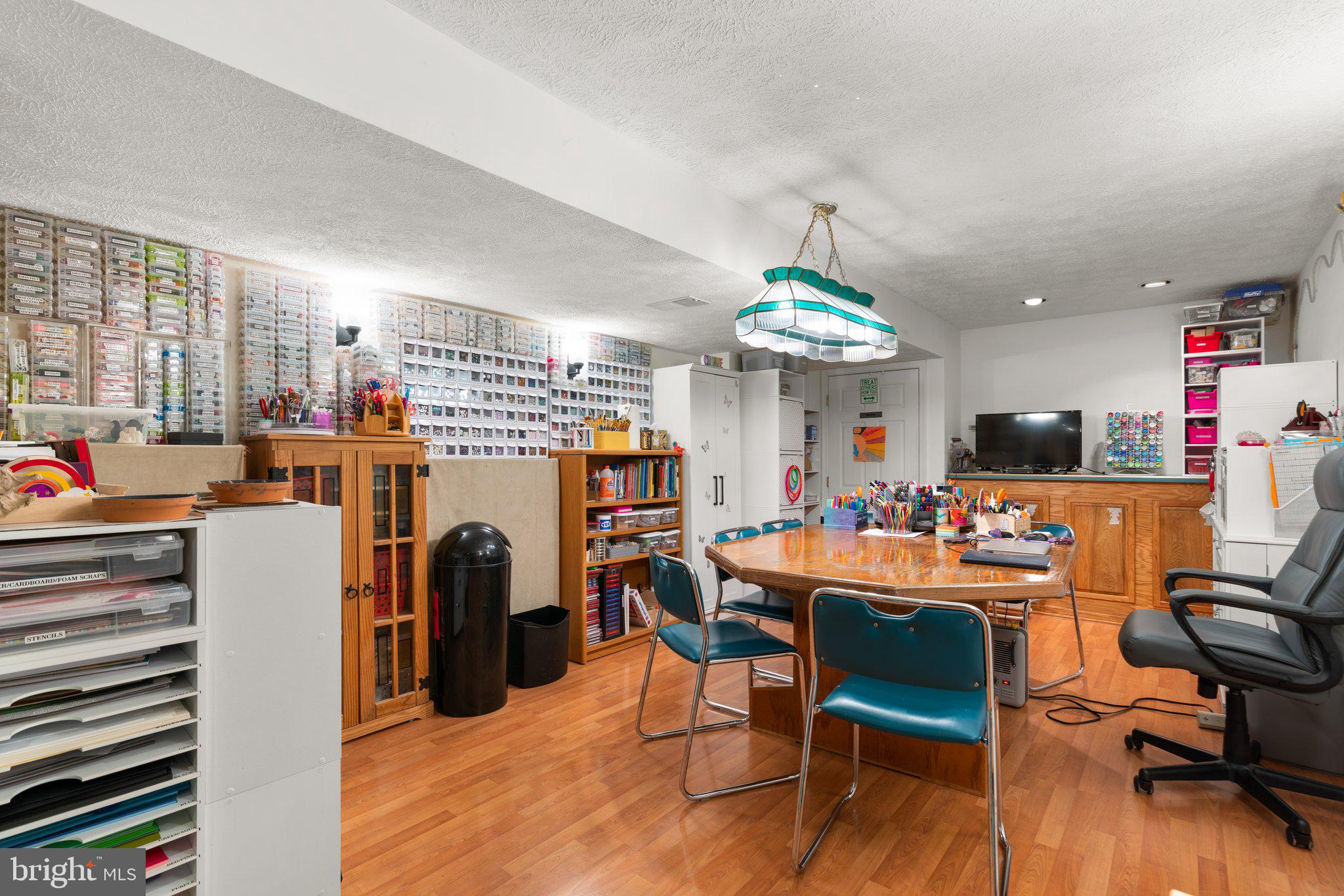 6445 Stream Valley Way Gaithersburg, MD 20882 - Photo 21 of 37 Finished lower level craft room