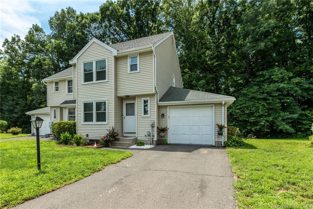 100 Allen Street Windsor, CT 06095 - Photo 1 of 1 a front view of a house with a garden