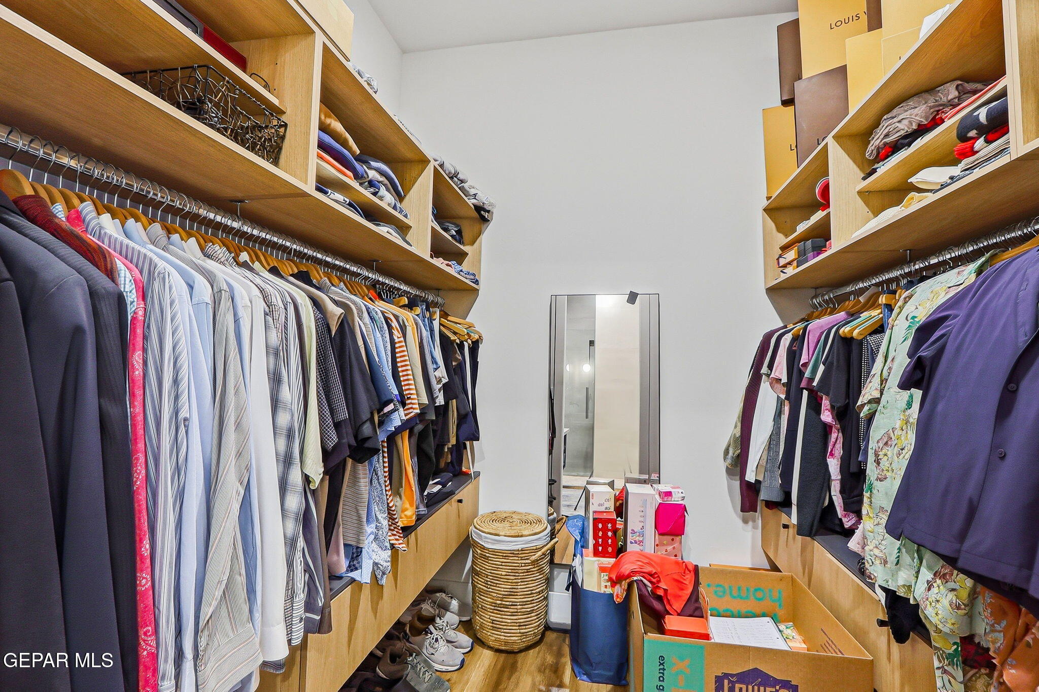 329 Rio El Rancho Court El Paso, TX 79932 - Photo 23 of 47 a view of walk in closet with clothes and shoes