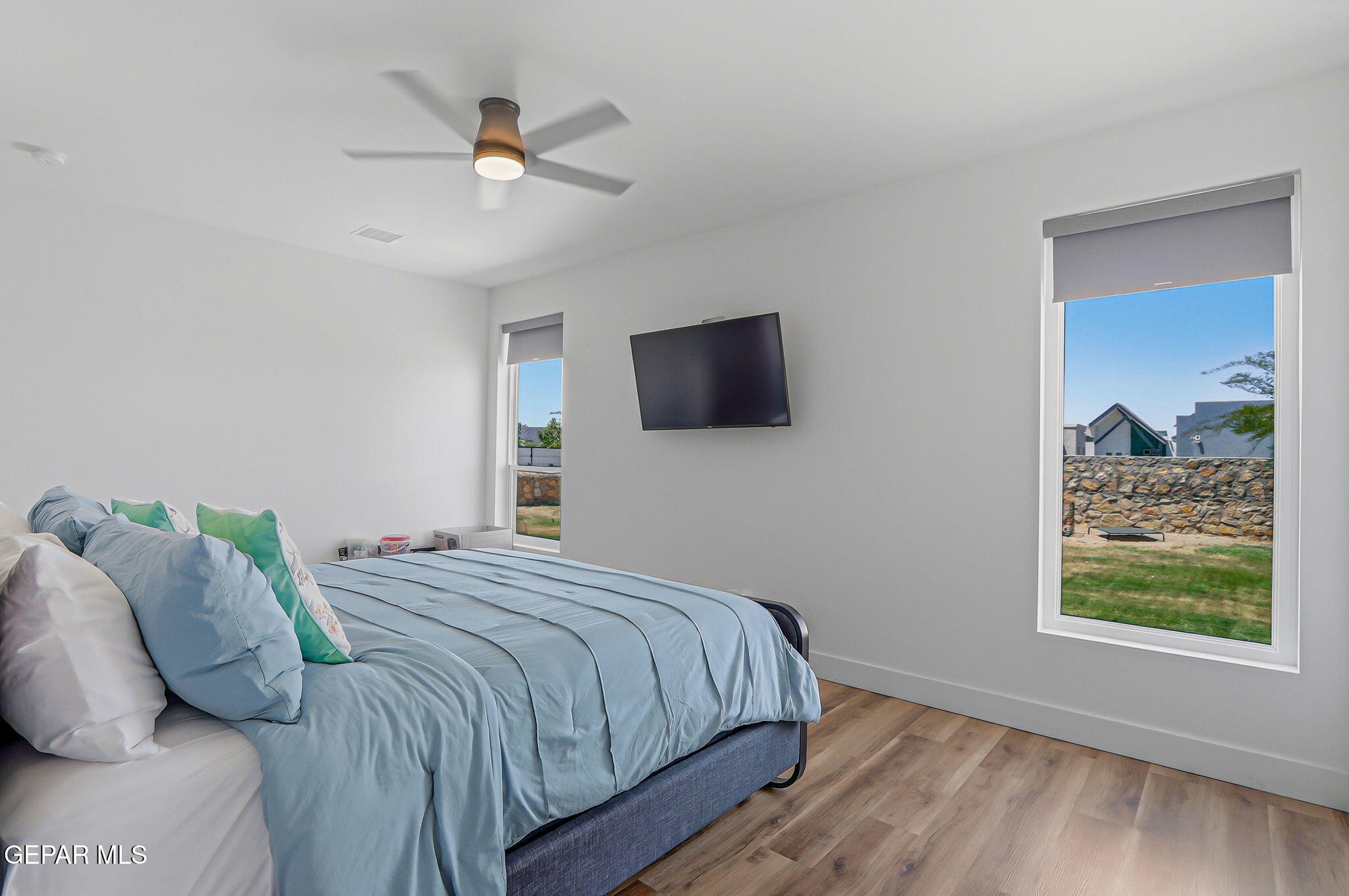 329 Rio El Rancho Court El Paso, TX 79932 - Photo 26 of 47 a bedroom with bed tv and a window