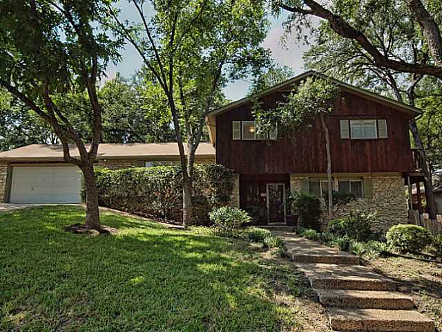 1806 Cedar Ridge Drive Austin, TX 78741 - Photo 1 of 1 a view of a house with a yard