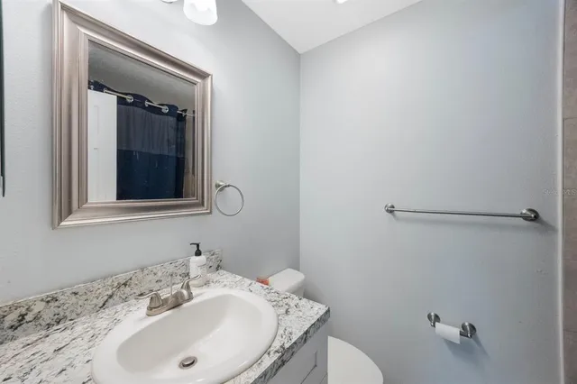 a bathroom with a sink and a toilet
