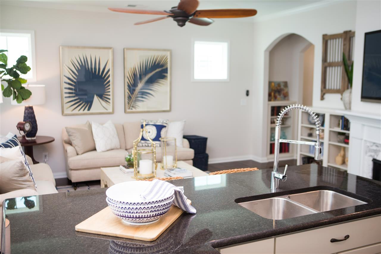 5305 Beckom Street, Unit TAYLOR I Raleigh, NC 27616 - Photo 4 of 15 Enjoy cooking while your guests are relaxing in the family room.This is a photo of the model. Wonderful space to have a family gathering