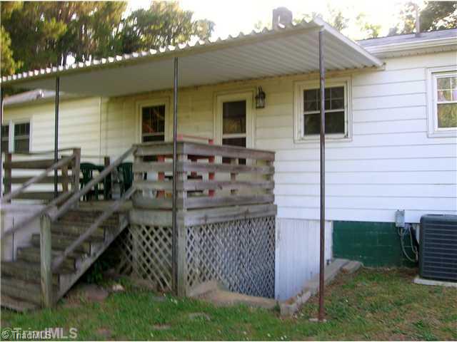 6705 Monnett Road Climax, NC 27233 - Photo 12 of 16 Patio/Deck. Back yard deck.