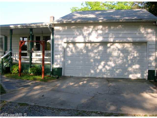 6705 Monnett Road Climax, NC 27233 - Photo 15 of 16 Parking Lot/Garage. Large garage and parking area