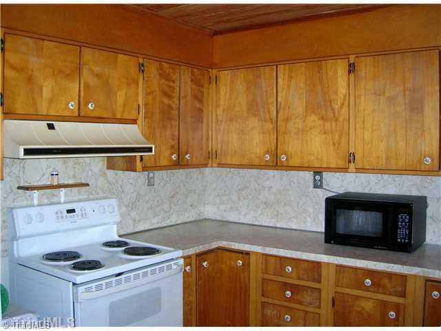 6705 Monnett Road Climax, NC 27233 - Photo 4 of 16 Kitchen. Cozy kitchen, all appliances stay.