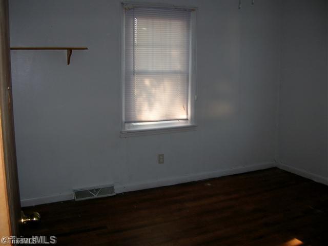 6705 Monnett Road Climax, NC 27233 - Photo 9 of 16 1st Bedroom. Hardwood floors throughout home.
