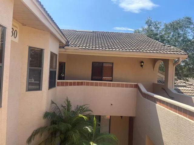 a front view of a house with a garage