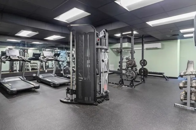 a view of a room with gym equipment