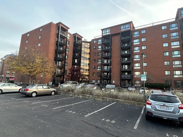 a car parked in front of a building