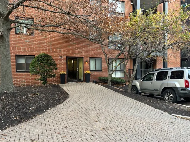 a view of a car in front of house