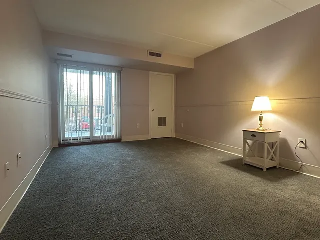 a view of a livingroom with furniture