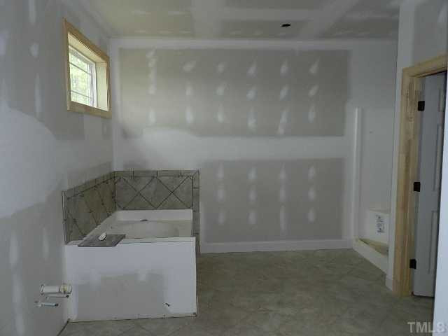 32 High Ridge Court Willow Spring, NC 27592 - Photo 10 of 23 a bathroom with a sink