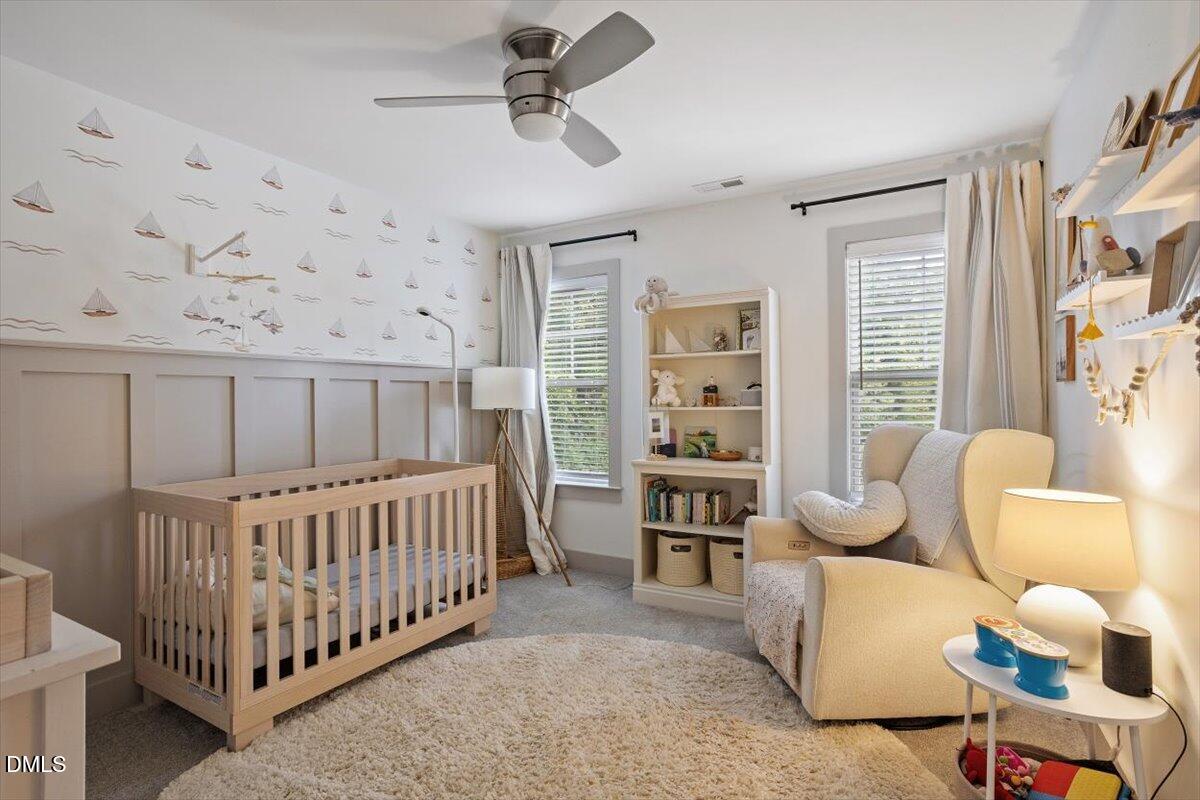 1303 Nottingham Road Raleigh, NC 27607 - Photo 21 of 33 a bedroom with furniture and a window